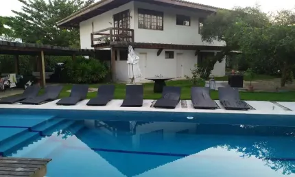 CASA COM 4 SUITES EM CONDOMÍNIO FECHADO NA ESTRADA DO COCO