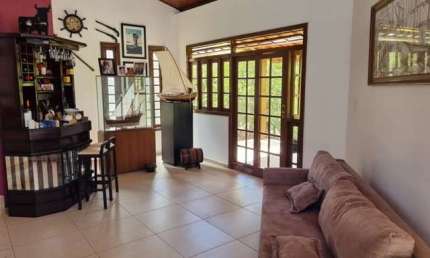 Casa em condomínio fechado com 5 quartos à venda no Jauá, Camaçari  por R$ 2.100.000
