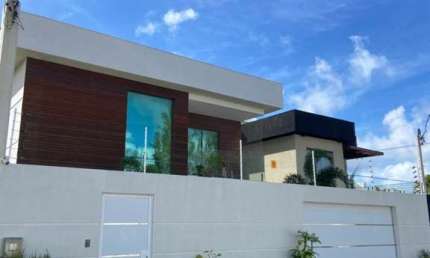Casa em condomínio fechado com 4 quartos à venda no Jauá, Camaçari  por R$ 900.000