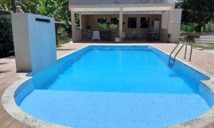 Casa em condomínio fechado com 3 quartos à venda no Jauá, Camaçari  por R$ 1.200.000