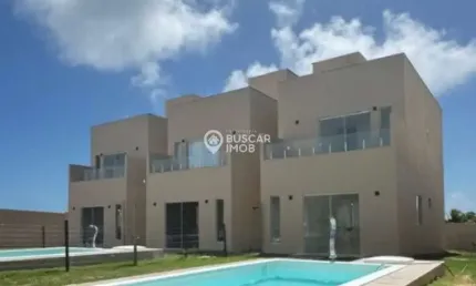 Casa em condomínio fechado com 3 quartos à venda na Barra do Jacuípe, Camaçari  por R$ 600.000