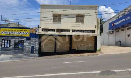 Imovel comercial na Avenida Sao Carlos para Venda ou Locacao, AREA 1 LOJA , com 90,25 metros, sala intermediaria 2 Camara, 1 banheiro, AREA 2 CASA com 300,09 metros, 2 salas, 3 dormitorios, 2 banheiro