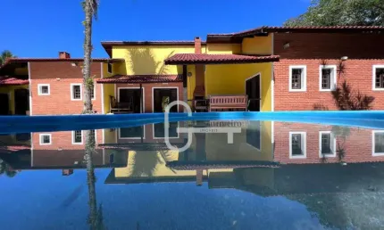 Casa com 3 dormitórios à venda, 354 m² por R$ 1.250.000,00 - Condomínio Residencial São Marcos - Peruíbe/SP