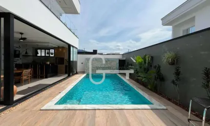 Casa com 4 dormitórios à venda, 320 m² por R$ 2.500.000,00 - Condomínio Flora Rica - Peruíbe/SP