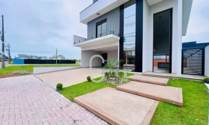 Casa com 4 dormitórios à venda, 231 m² por R$ 1.900.000,00 - Condomínio Flora Rica - Peruíbe/SP
