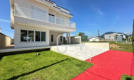 Casa com 4 dormitórios à venda, 255 m² por R$ 1.765.000,00 - Condomínio Flora Rica - Peruíbe/SP