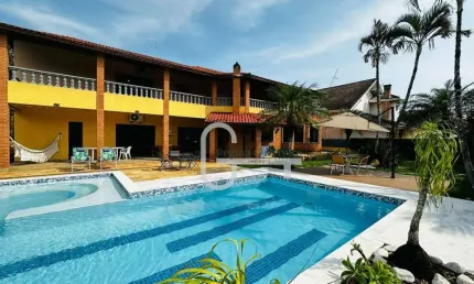 Casa com 5 dormitórios à venda, 461 m² por R$ 2.200.000,00 - Bougainvillee III - Peruíbe/SP