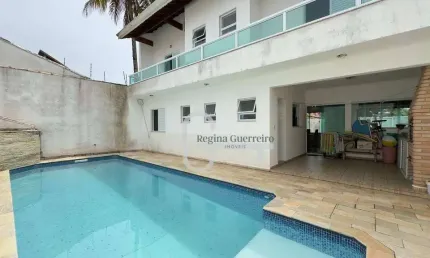 Casa com 4 dormitórios à venda, 179 m² por R$ 900.000,00 - Parque Turístico - Peruíbe/SP