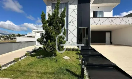 Casa com 3 dormitórios à venda, 223 m² por R$ 1.500.000,00 - Condomínio Flora Rica - Peruíbe/SP
