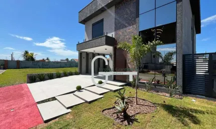 Casa com 4 dormitórios à venda, 262 m² por R$ 2.000.000,00 - Condomínio Flora Rica - Peruíbe/SP