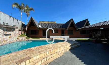 Casa com 4 dormitórios à venda, 153 m² por R$ 850.000,00 - Balneário Três Marias - Peruíbe/SP