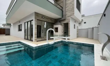 Casa com 4 dormitórios à venda, 210 m² por R$ 1.750.000,00 - Bougainvillee Residencial IV - Peruíbe/SP