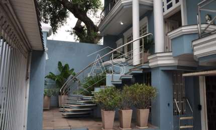 Casa com 4 quartos à venda na Rua Carlos Huber, 1028, Três Figueiras, Porto Alegre por R$ 2.100.000