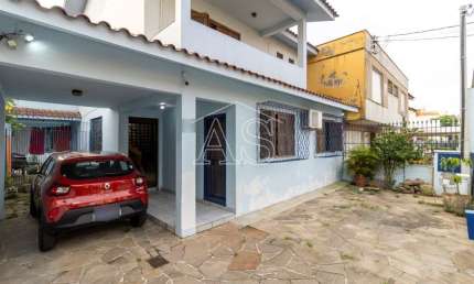 Casa com 3 quartos à venda na Rua Coronel Jaime da Costa Pereira, 318, Partenon, Porto Alegre, 274 m2 por R$ 765.000