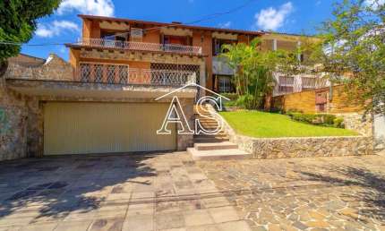 Casa com 5 quartos à venda na Rua Primeiro de Março, 721, Partenon, Porto Alegre, 417 m2 por R$ 1.149.000