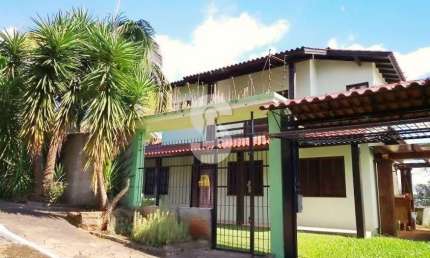 Casa com 4 quartos à venda no Feitoria, São Leopoldo  por R$ 920.000