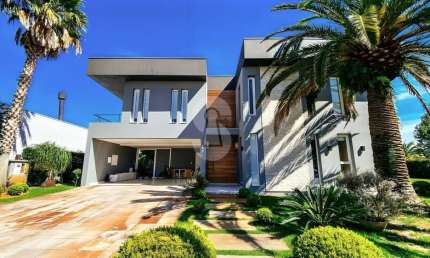 Casa em condomínio fechado com 5 quartos à venda no Remanso, Xangri-Lá  por R$ 5.830.000