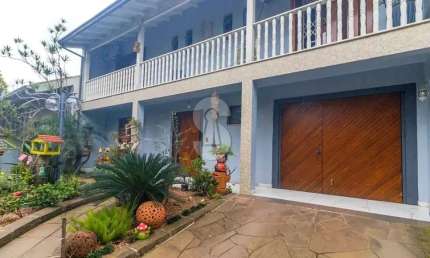 Casa com 4 quartos à venda no Jardim América, São Leopoldo  por R$ 850.000
