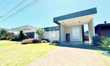 Casa em condomínio fechado com 4 quartos à venda no Condomínio Riviera Xangri-Lá, Xangri-Lá  por R$ 1.950.000