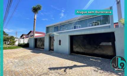 Casa Comercial ou Residencial para Alugar ou Vender no Ahú com 5 quartos, 2 suítes, lareira, churrasqueira e Edícula com 700m por R13.500/mês