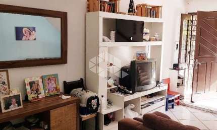Casa em condomínio fechado com 2 quartos à venda na Rua Almiro Coimbra, 110, Morro Santana, Porto Alegre por R$ 245.000