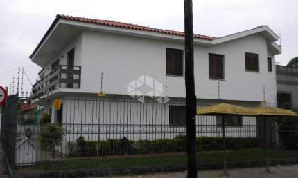 Casa com 4 quartos à venda na Rua Felisberto Pereira, 167, Jardim Itu Sabará, Porto Alegre por R$ 1.000.000