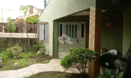 Casa com 3 quartos à venda na Rua Rudi Schaly, 625, Parque Santa Fé, Porto Alegre por R$ 299.000