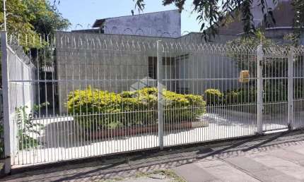 Casa com 3 quartos à venda na Rua General Caldwell, 1250, Menino Deus, Porto Alegre por R$ 560.000