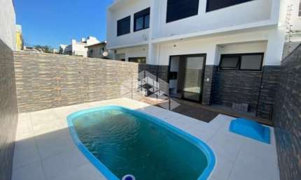 Casa com 3 quartos à venda na Rua Lagoa do Peixe, 91, Sarandi, Porto Alegre por R$ 980.000