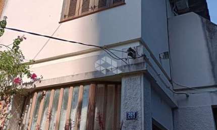 Casa com 2 quartos à venda na Rua Coronel Paulino Teixeira, 269, Rio Branco, Porto Alegre por R$ 1.199.000