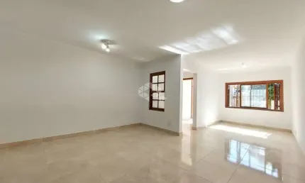 Casa com 3 quartos à venda na Rua Oiampi, 420, Guarujá, Porto Alegre por R$ 600.000