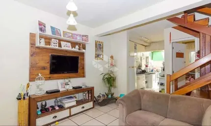 Casa em condomínio fechado com 3 quartos à venda na Rua Engenheiro Frederico Dahne, 255, Sarandi, Porto Alegre por R$ 389.000