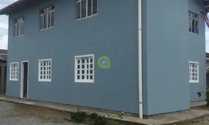 Casa comercial a venda bairro Ponte do Imaruim, em Palhoça, conta com 4 apartame