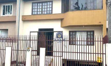 Sobrado com 3 dormitórios à venda, 139 m² por R$ 530.000,00 - Uberaba - Curitiba/PR