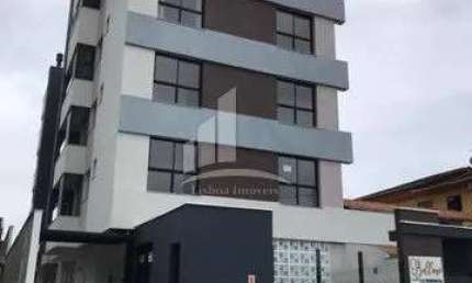 Apartamento com churrasqueira e suíte no Costa e Silva.