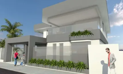 Vendo um terreno de 400m² plano com a construção de uma casa inacabada. O projeto é lindo, mas pode ser modificado. A localização é ótima!