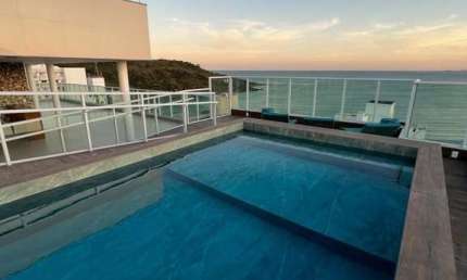Apartamento à venda na Praia do Morro, Guarapari-ES: 3 quartos, 1 suíte, vista mar e lazer completo. Mobiliado e decorado. Venha conferir!