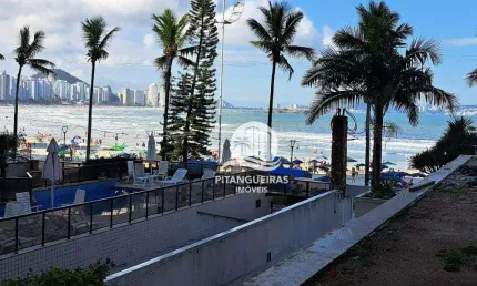 Prédio frente ao mar na astúrias, apartamento com 4 suítes, 2 vagas para auto.