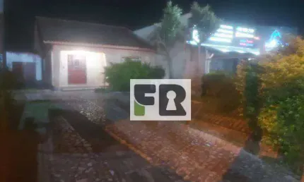 Excelente casa de 2 dormitórios com 5 vagas de garagem, bairro Americana, 550m²- Alvorada-Rs.