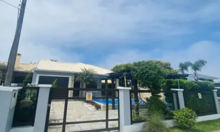 Casa em condomínio fechado com 4 quartos à venda na Rua Rio Comandaí, 1302, Centro, Xangri-Lá por R$ 930.000