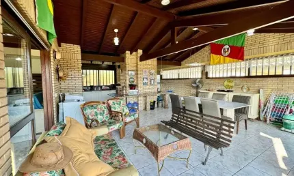 Casa em condomínio fechado com 4 quartos à venda na Camaquã, 360, Remanso, Xangri-Lá por R$ 1.050.000