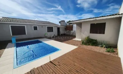 Casa em condomínio fechado com 2 quartos à venda na Avenida Interbalneários, 572, Rainha do Mar, Xangri-Lá por R$ 480.000