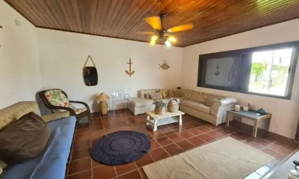 Casa em condomínio fechado com 3 quartos à venda na Rua Rio Mampituba, 809, Centro, Xangri-Lá por R$ 650.000