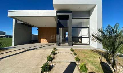 Casa em condomínio fechado com 3 quartos à venda na Rs 389, Estrada do Mar, 27, Santorini, Xangri-Lá por R$ 900.000