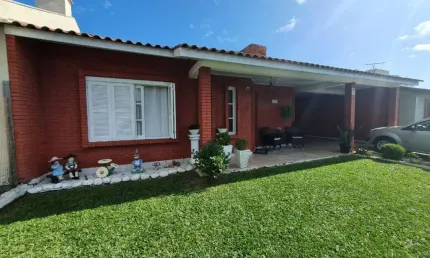 Casa em condomínio fechado com 3 quartos à venda na Rua Dos Girassóis, 621, Noiva Do Mar, Xangri-Lá por R$ 629.990