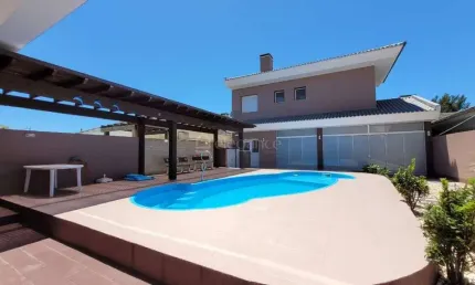 Casa em condomínio fechado com 6 quartos à venda na Das Camelias, 593, Noiva Do Mar, Xangri-Lá por R$ 1.350.000