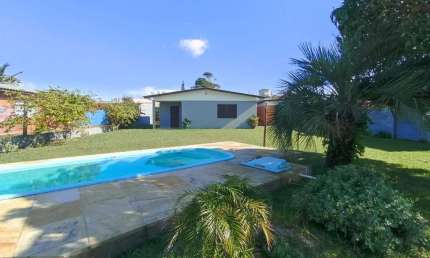 Casa em condomínio fechado com 3 quartos à venda na Emboá, 525, Atlântida, Xangri-Lá por R$ 750.000