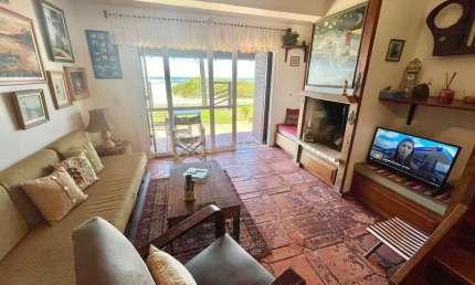 Casa em condomínio fechado com 2 quartos à venda na Beira Mar, 9, Centro, Xangri-Lá por R$ 580.000