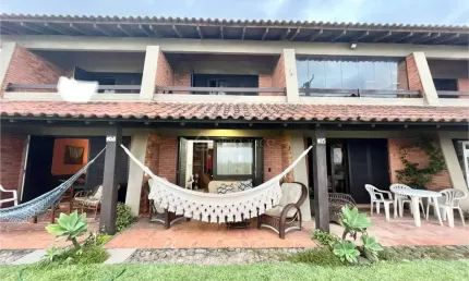 Casa em condomínio fechado com 2 quartos à venda na Beira Mar, 9, Centro, Xangri-Lá por R$ 620.000