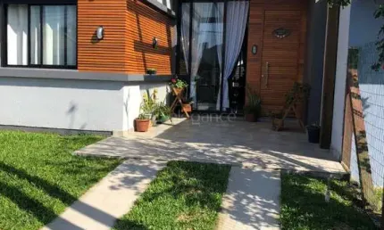 Casa com 3 quartos à venda na Avenida Norte, 767, Noiva Do Mar, Xangri-Lá por R$ 610.000
